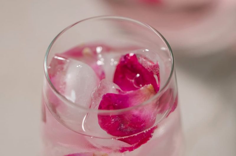 fresh rose water in glass prepared to be put in humidifier