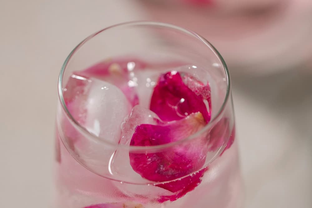 fresh rose water in glass prepared to be put in humidifier