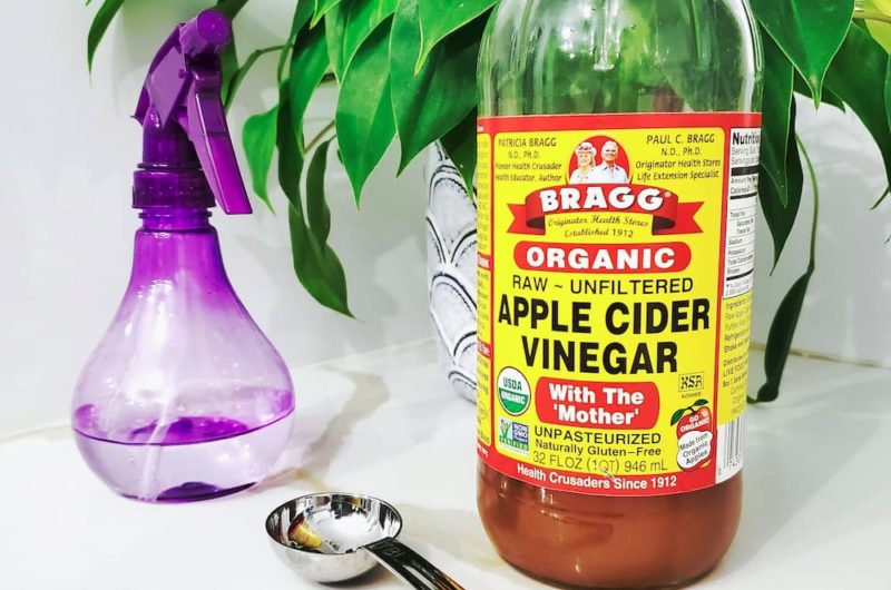 apple cider vinegar solution being prepared for humidifier cleaning